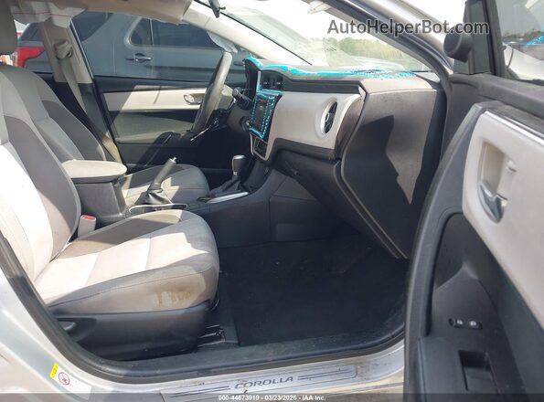 2T1BURHE5HC847678 2017 TOYOTA LL Серебряный Вид салона спереди