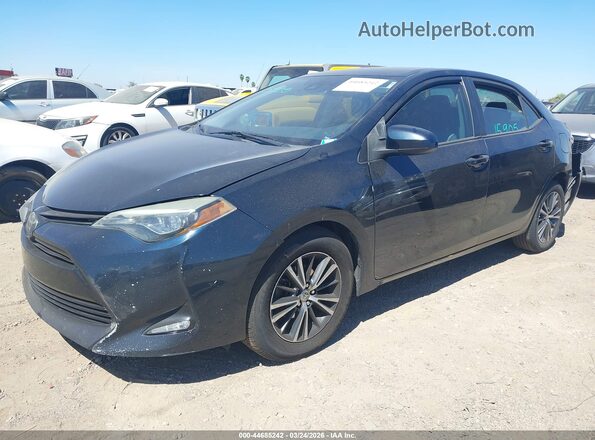 2T1BURHE7JC995708 2018 TOYOTA LL Black Front left