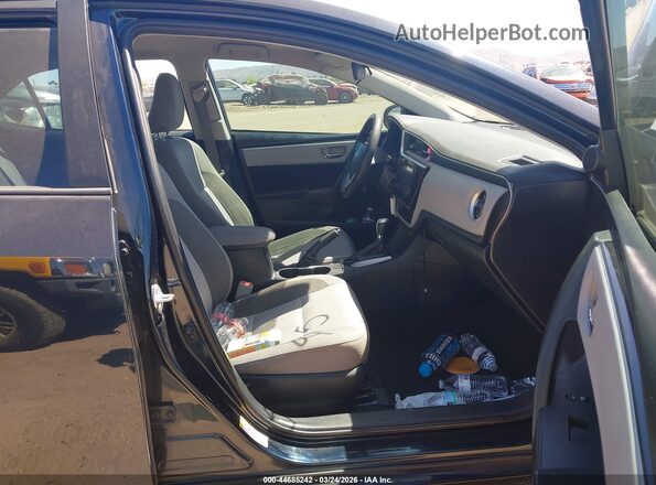 2T1BURHE7JC995708 2018 TOYOTA LL Black Front interior view