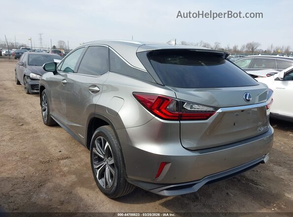 2T2BGMCA4JC024014 2018 LEXUS RX 450H Silver Trasero izquierdo