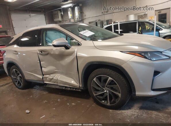 2T2BGMCA7KC039382 2019 LEXUS RX 450H Champagne ხელსაწყოთა პანელის ხედი