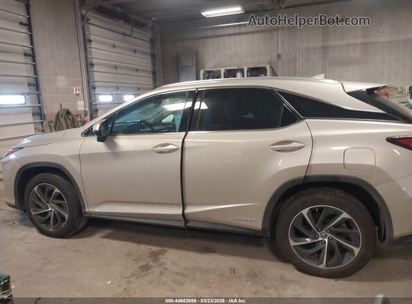 2T2BGMCA7KC039382 2019 LEXUS RX 450H Champagne უკანა სალონის ხედი
