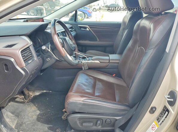2T2BZMCA0HC066474 2017 LEXUS RX Золотой Вид салона спереди