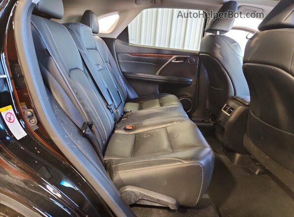 2T2BZMCA3GC007689 2016 LEXUS RX Black Vista interior trasera