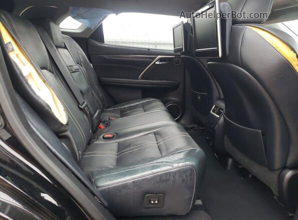 2T2BZMCA4GC034982 2016 LEXUS RX Black Vista interior trasera
