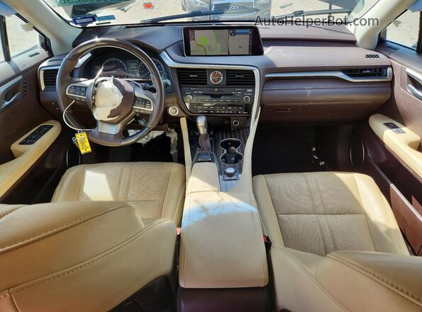 2T2BZMCA5JC142180 2018 LEXUS RX Черный Вид панели приборов