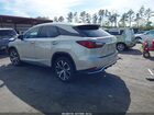2020 Lexus Rx 450h   Champagne vin: 2T2HGMDA6LC043904