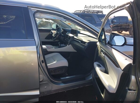 2T2HZMAA4MC215654 2021 LEXUS RX 350 Серебряный Вид салона спереди