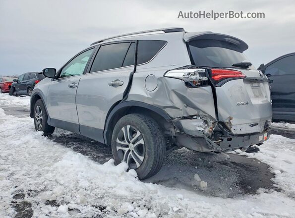 2T3BFREV4HW545819 2017 TOYOTA LE Серебряный Задняя левая четверть