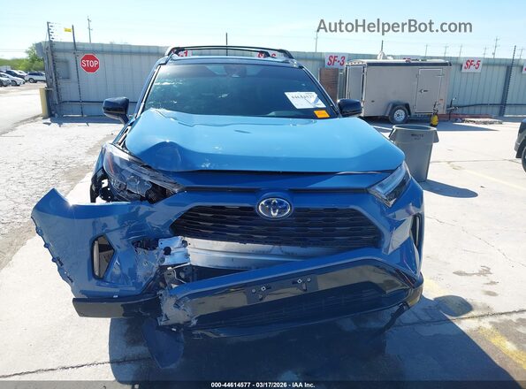 2T3E6RFV5RW059176 2024 TOYOTA RAV4 HYBRID Blue Widok wnętrza z tyłu
