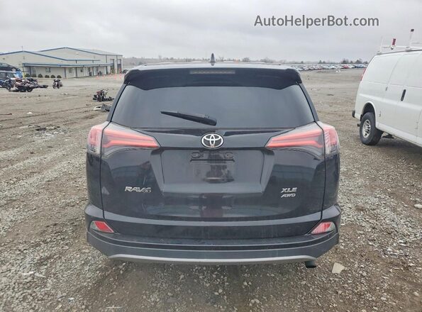 2T3RFREVXJW705447 2018 TOYOTA RAV4 Black Vista trasera