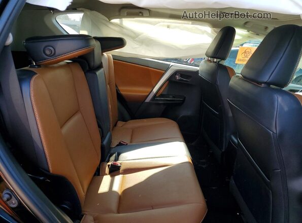 2T3YFREV9JW463696 2018 TOYOTA LIMITED Black Vista interior trasera