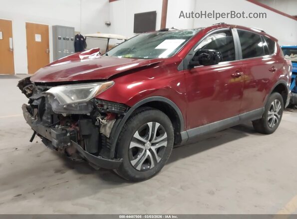 2T3ZFREV6JW425010 2018 TOYOTA LE Red Առջևի ձախ երեք քառորդ տեսարան