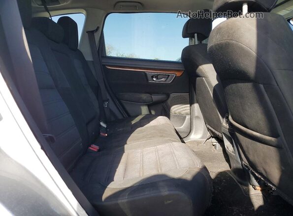 7FARW1H58HE000423 2017 HONDA CRV Серебряный Вид задней части салона
