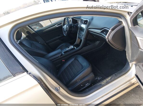 3FA6P0HD4HR401985 2017 FORD FUSION Gold Widok wnętrza z przodu