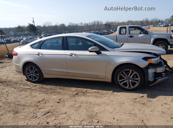 3FA6P0HD4HR401985 2017 FORD FUSION Gold Widok wnętrza z tyłu