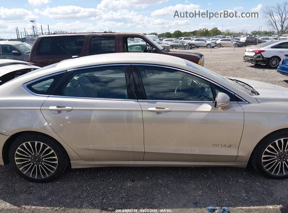 3FA6P0RU3JR140949 2018 FORD FUSION HYBRID Золотой Вид задней части салона