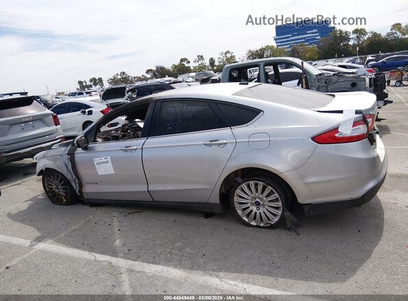 3FA6P0UU7GR218603 2016 FORD FUSION HYBRID Серебряный Вид задней части салона