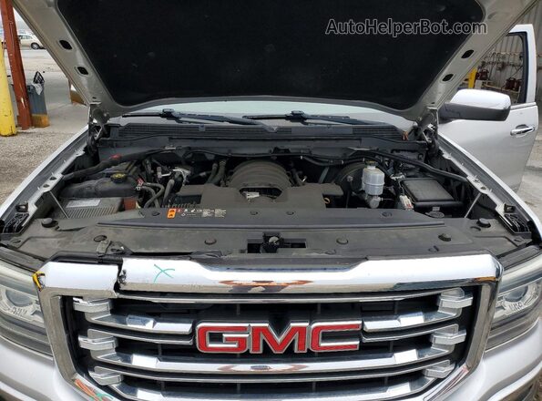 3GTU2NEC4JG631178 2018 GMC SIERRA Серебряный Вид задней части салона