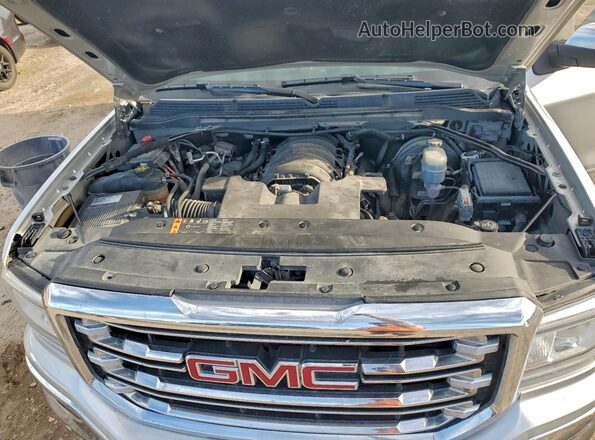 3GTU2NEJ2JG522281 2018 GMC SIERRA Серебряный Вид задней части салона