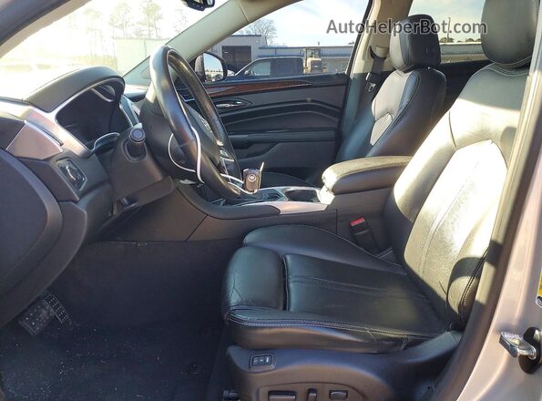 3GYFNBE34GS581106 2016 CADILLAC SRX Silver Widok wnętrza z przodu