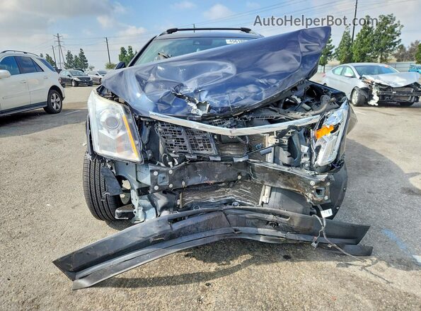 3GYFNDE30GS537907 2016 CADILLAC SRX Blue Front view
