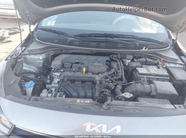 3KPA24AD6PE619694 2023 KIA RIO Серебряный Вид сзади