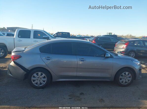 3KPA24AD6PE619694 2023 KIA RIO Серебряный Вид задней части салона