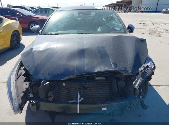 3KPF24AD2PE621478 2023 KIA FORTE Gray Vista interior trasera