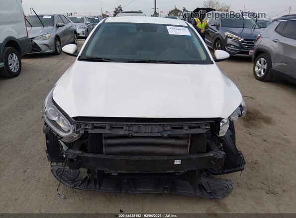3KPF24AD4ME396704 2021 KIA FORTE Белый Вид задней части салона