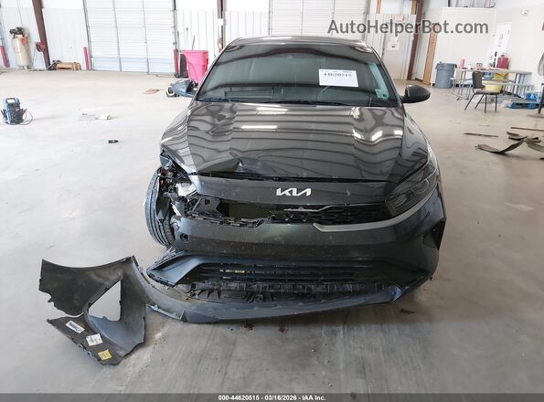 3KPF24AD7PE567773 2023 KIA FORTE Серый Вид задней части салона