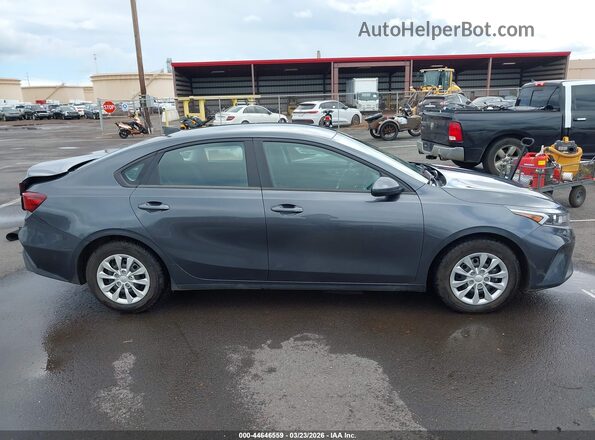 3KPF24AD7PE676959 2023 KIA FORTE Серый Вид задней части салона
