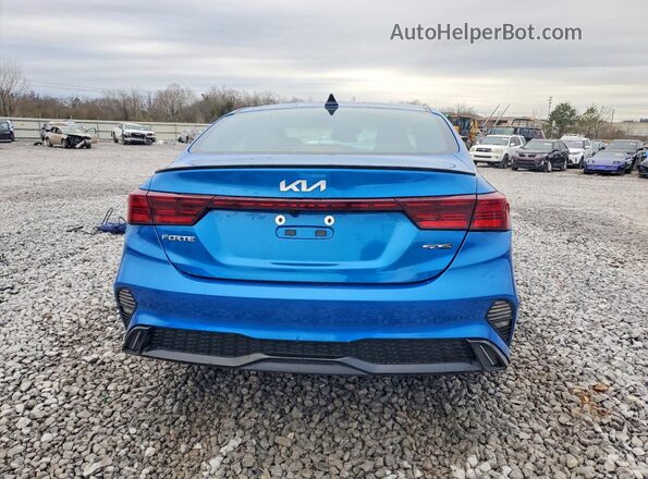 3KPF54AD8RE704049 2024 KIA FORTE Синий Вид сзади