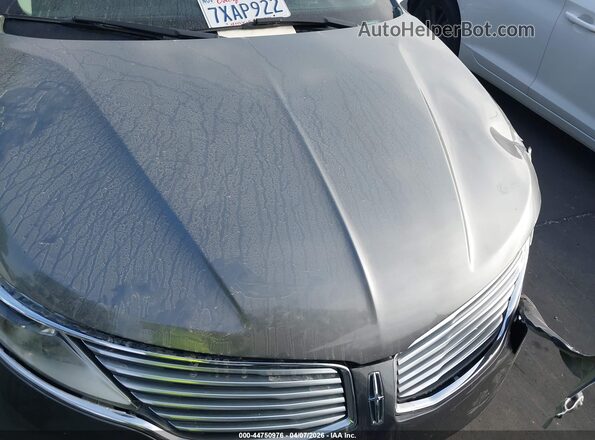 3LN6L2LU0GR620722 2016 LINCOLN MKZ HYBRID Gray Widok z tyłu