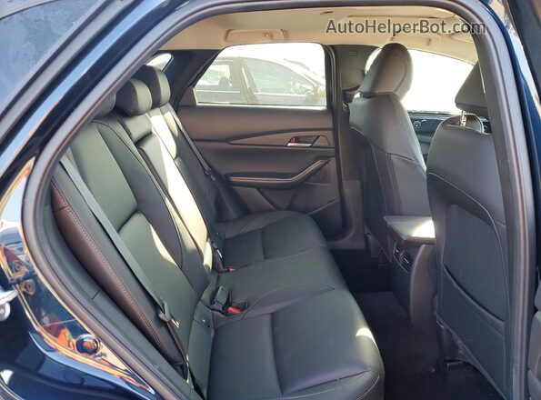 3MVDMBCL6TM112809 2026 MAZDA CX-30 Blue Rear interior view