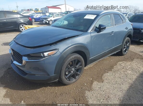 3MVDMBCM8SM814704 2025 MAZDA CX-30 Dark Blue Vista tres cuartos delantera izquierda