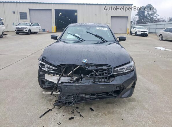 3MW49FS02P8C85675 2023 BMW M3 Black Դիմացի տեսք
