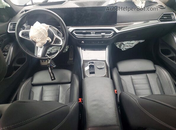 3MW49FS02P8C85675 2023 BMW M3 Black Առջևի վահանակի տեսք