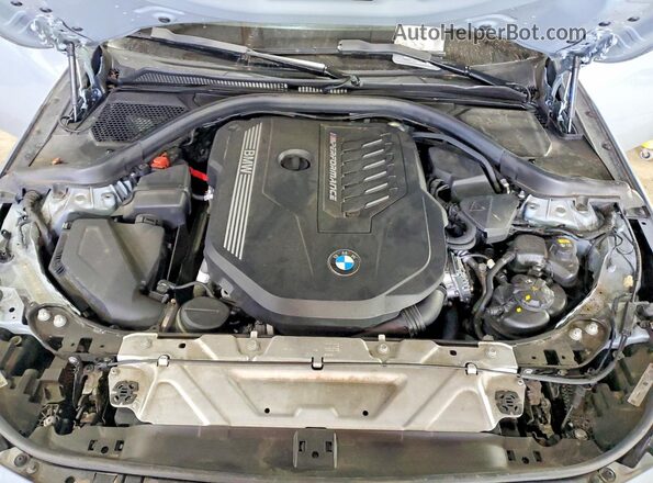 3MW53CM07N8C51083 2022 BMW M2 Серый Вид задней части салона