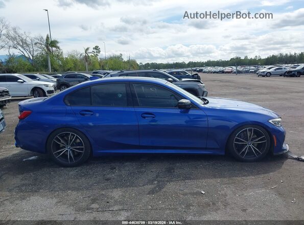 3MW5U7J06M8B55503 2021 BMW M3 Blue Սալոնի հետևի տեսք