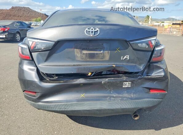 3MYDLBYV4HY155609 2017 TOYOTA YARIS Gray Вид ззаду