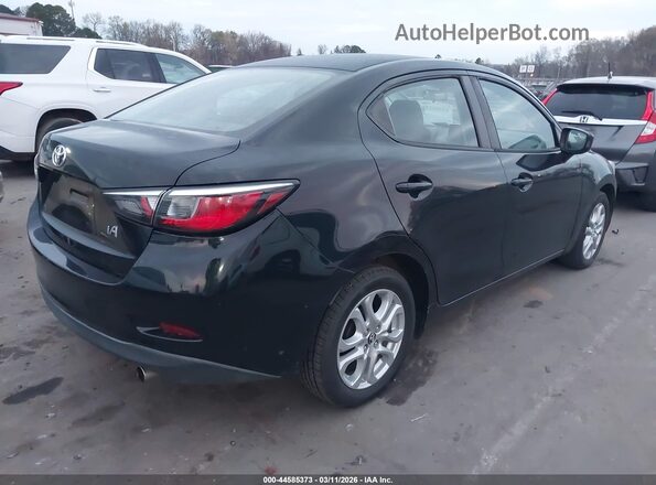 3MYDLBYV7HY148993 2017 TOYOTA YARIS IA Black Tył prawy