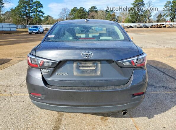 3MYDLBYV7KY503622 2019 TOYOTA YARIS Gray Rear view