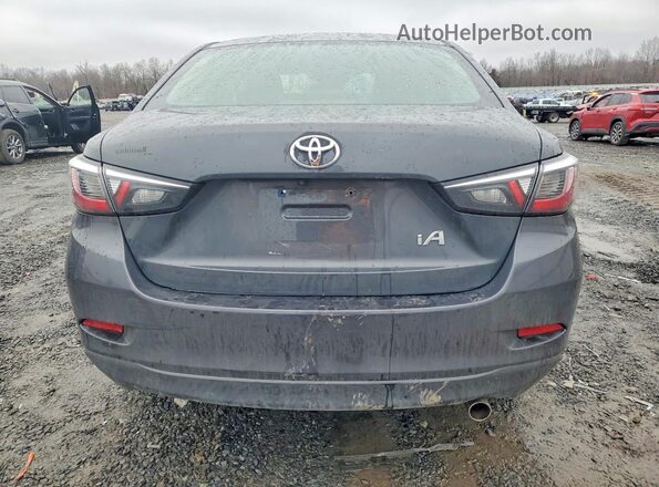 3MYDLBYVXHY180367 2017 TOYOTA YARIS Charcoal Rear view