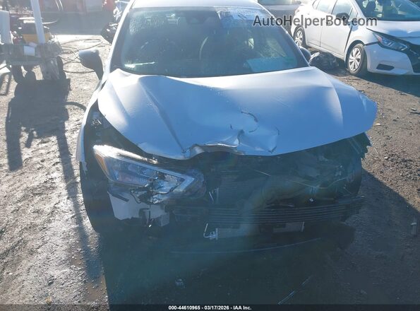 3N1CN8FV9PL860110 2023 NISSAN VERSA Серебряный Вид спереди