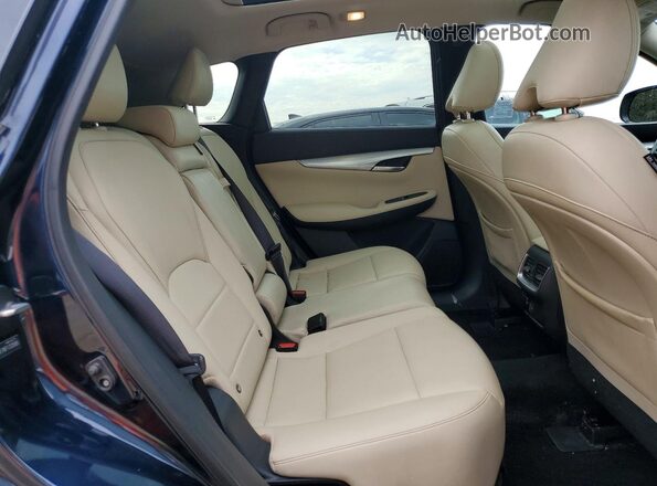 3PCAJ5M17KF133585 2019 INFINITI QX50 Blue Rear seats view