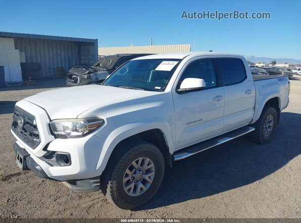 3TMCZ5AN3JM159975 2018 TOYOTA TACOMA White წინა მარცხენა ხედი სამი მეოთხედიდან