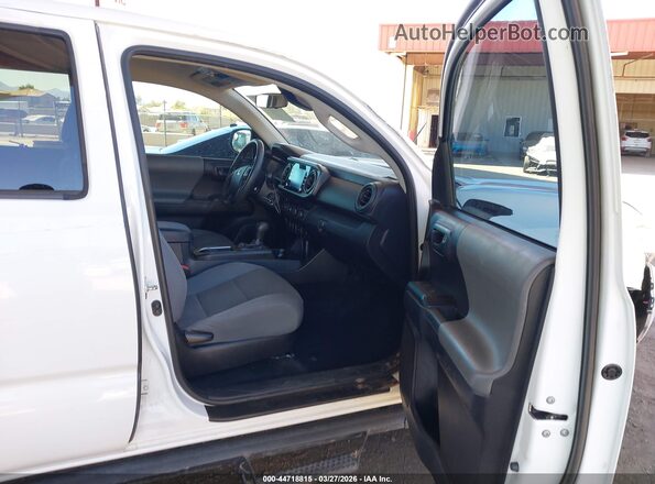 3TMCZ5ANXLM300091 2020 TOYOTA TACOMA White წინა სალონის ხედი