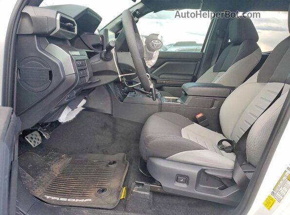 3TMLB5JN0TM223770 2026 TOYOTA LE Белый Вид салона спереди