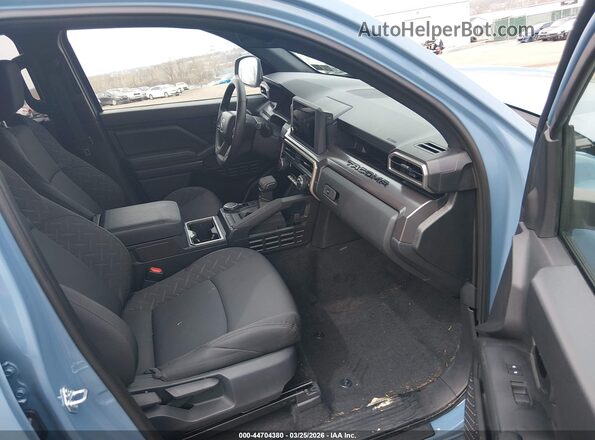 3TMLB5JN8TM221880 2026 TOYOTA TACOMA Синий Вид салона спереди